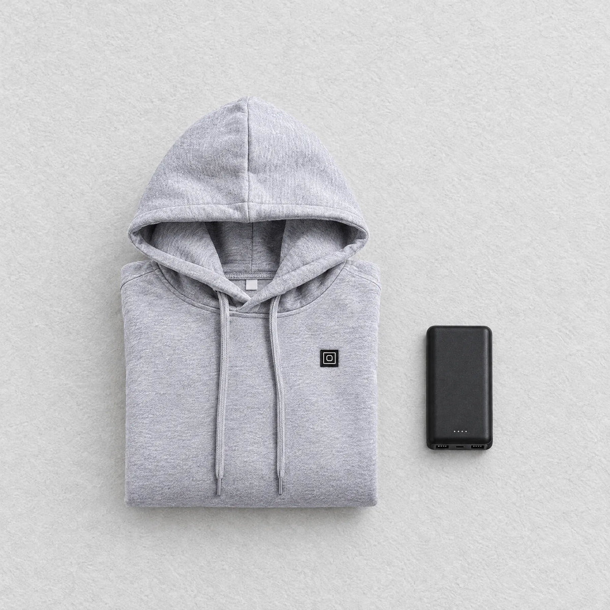 Lieferumfang: beheizter Hoodie und Powerbank 5.000 mAh