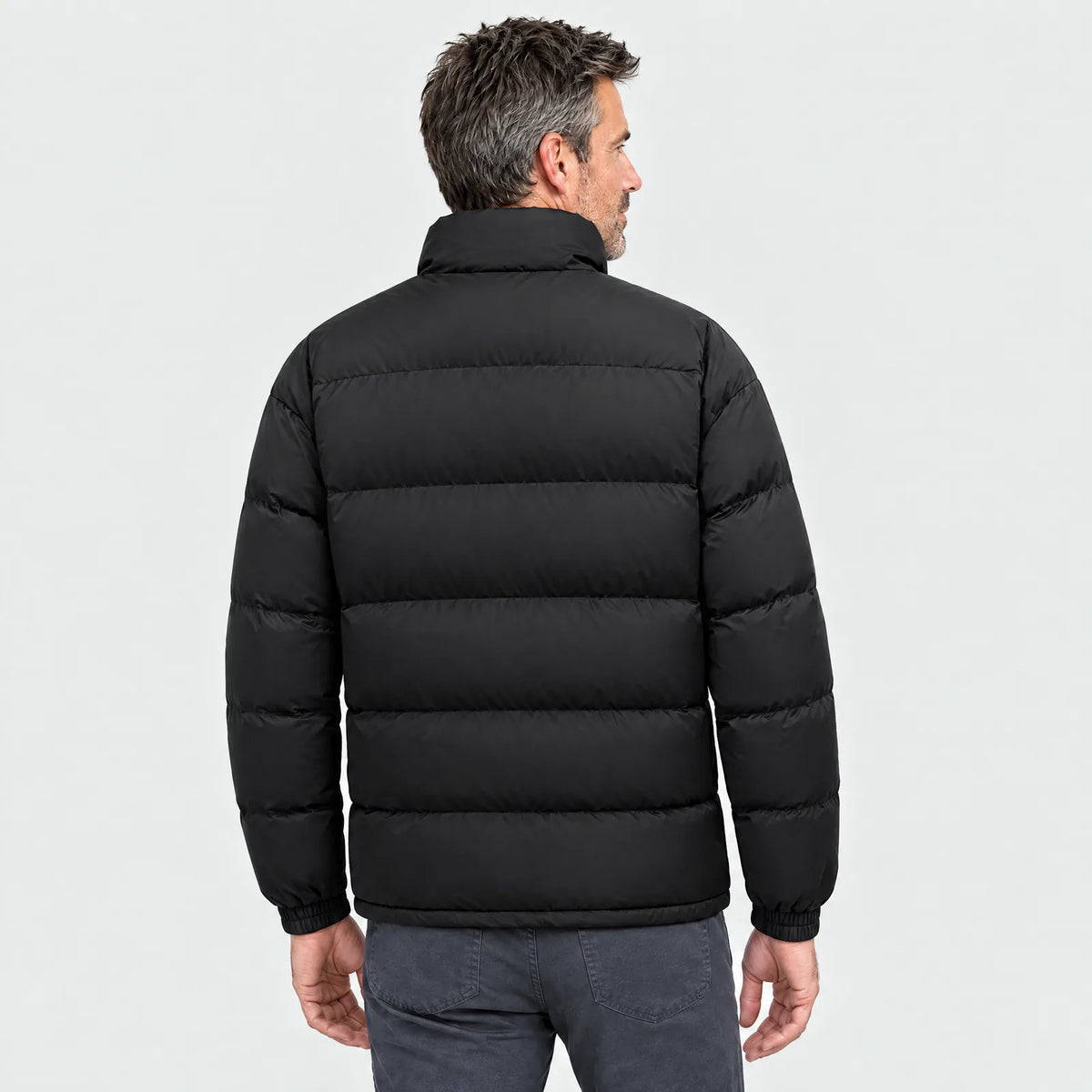 Beheizte Steppjacke in Schwarz von hinten